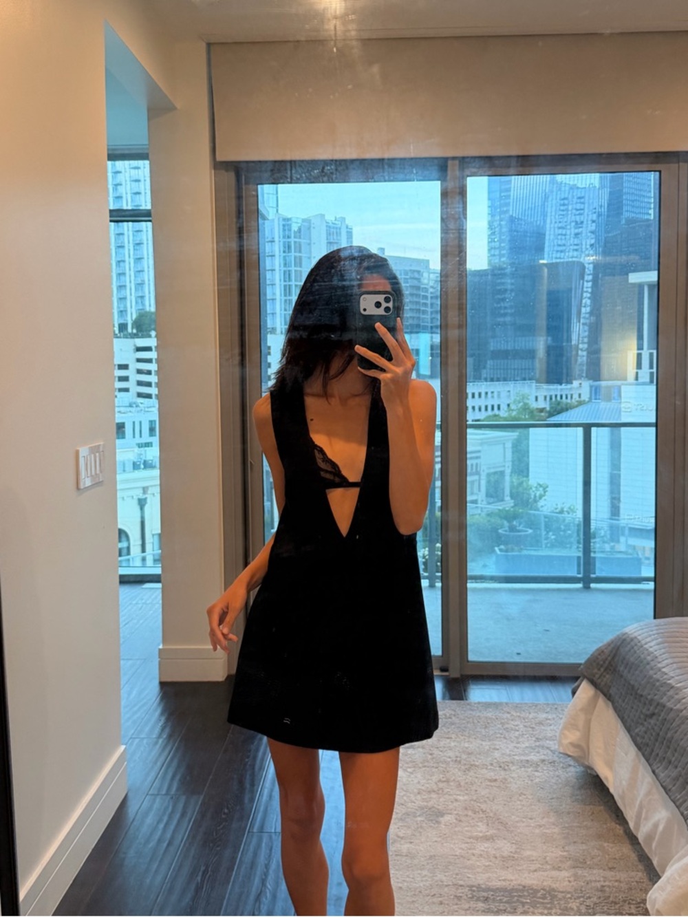 Deep V black minidress size S